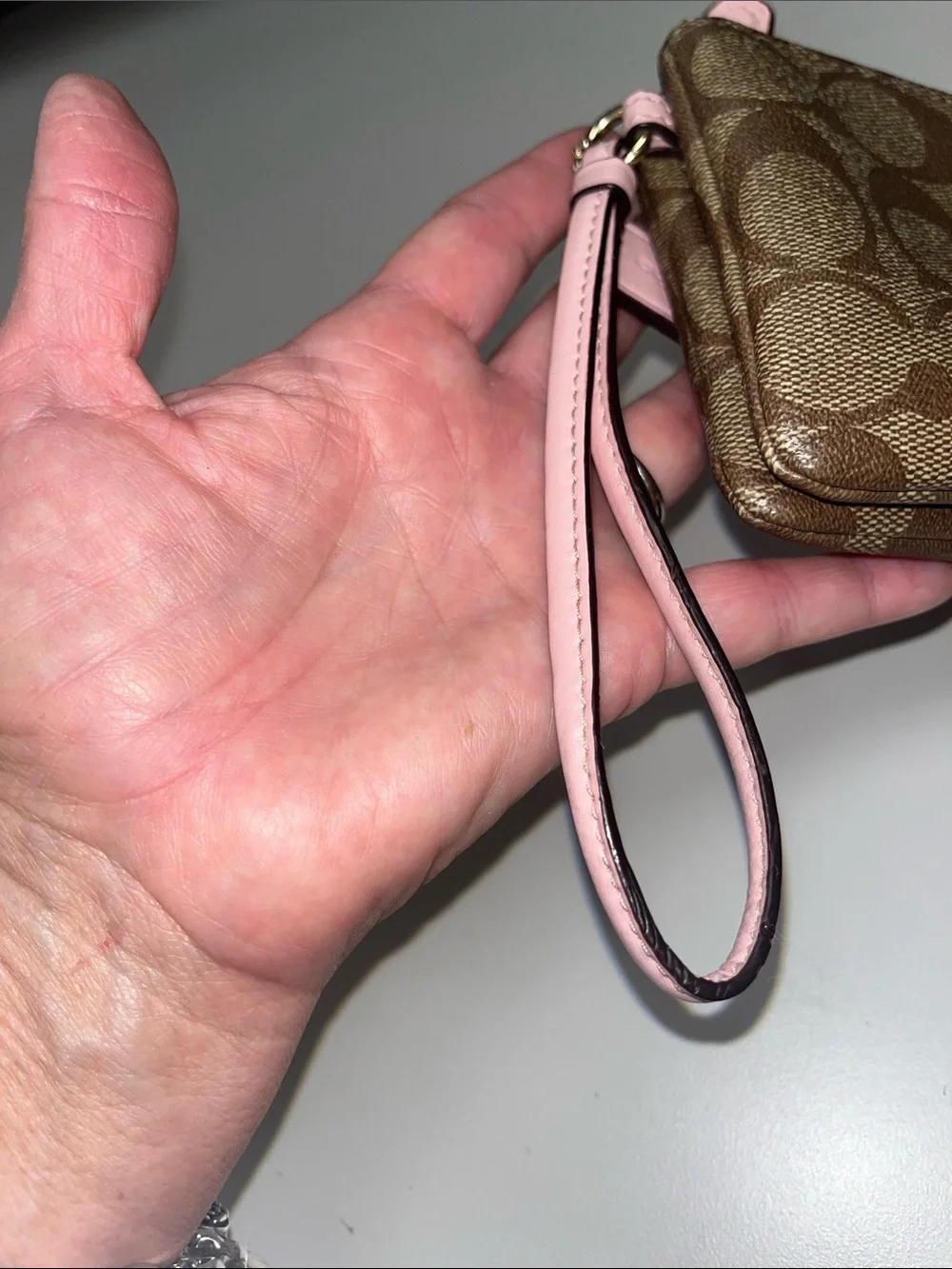 Coach Brown Signature Canvas Wristlet with Pink Trim